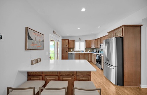 Hewitt House | Lakefront Haven Private Beach Dock Fire Pit Game Room Boat Rental