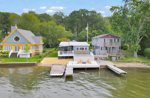 Hewitt House | Lakefront Haven Private Beach Dock Fire Pit Game Room Boat Rental