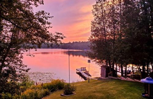 Curtis Township House | Lakefront Hideaway with Dock, Kayaks, Fire Pit!