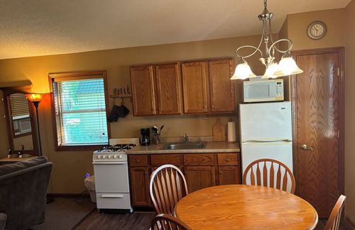 Manchester Cabin | Lakeside Cabin 2 - Perfect Retreat at Enriched Cabins & Resort on Lake Delhi