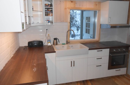 Skaulo House | Lakeside Cottage in Lapland