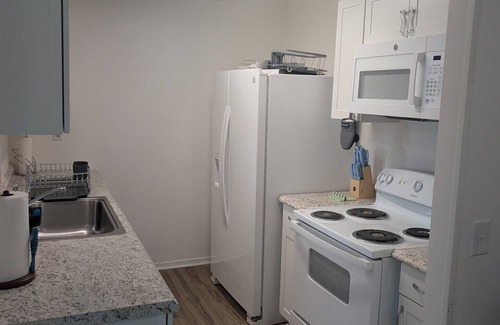 Lakeside House | Lakeside Retreat with Big Porch, Extra Parking, and Prime Downtown Location