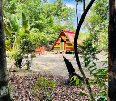 Zanderij Cabin | Land of Promise - Reggae Escape