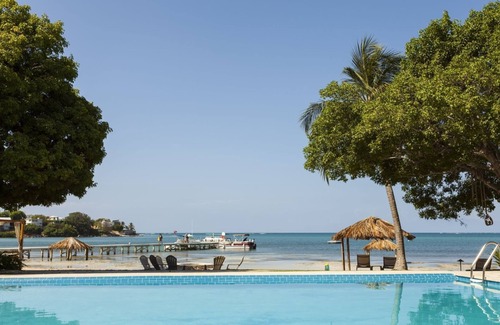 Carenero Apartment | Large 1BR Unit with Kitchenette & Balcony w/Caribbean Sea Views! Pools & Spa!