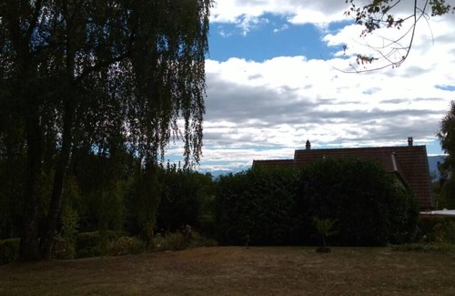 Prevessin-Moens House | Large double room, balcony, and view of large garden and the Alps