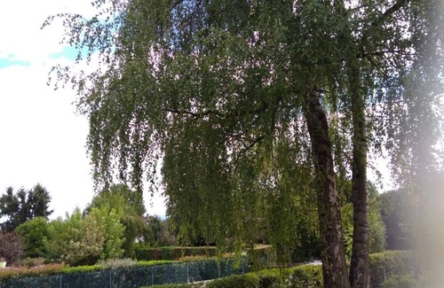 Prevessin-Moens House | Large double room, balcony, and view of large garden and the Alps