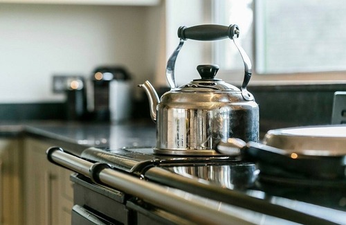 Shere House | Large family home in stunning setting, wonderful views, pool, tennis court