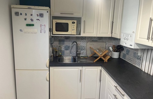 Guilhemery Apartment | Large two-bedroom apartment with three double beds and secure parking.