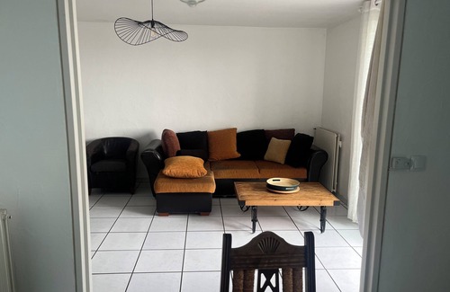 Guilhemery Apartment | Large two-bedroom apartment with three double beds and secure parking.