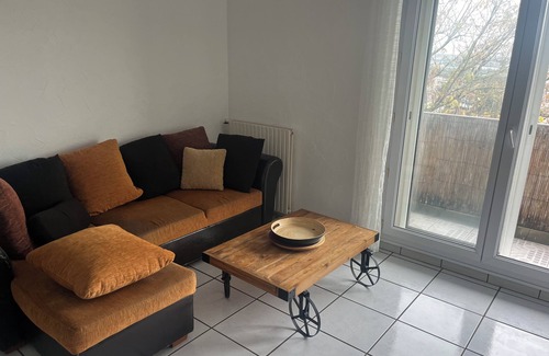 Guilhemery Apartment | Large two-bedroom apartment with three double beds and secure parking.