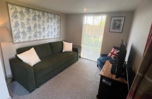 Wicklewood Apartment | Lavender Lodge - Pool and Hot Tub with sunset views over open fields