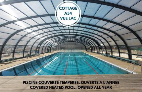 Leon Apartment | LE COTTAGE VUE LAC-2 vélos-Village Vacances Nature de 70ha! avec piscines et animations