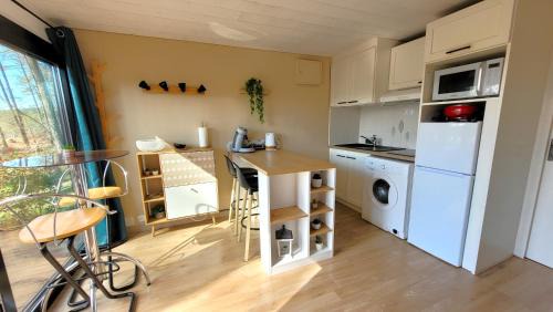 Leon Apartment | LE COTTAGE VUE LAC-2 vélos-Village Vacances Nature de 70ha! avec piscines et animations