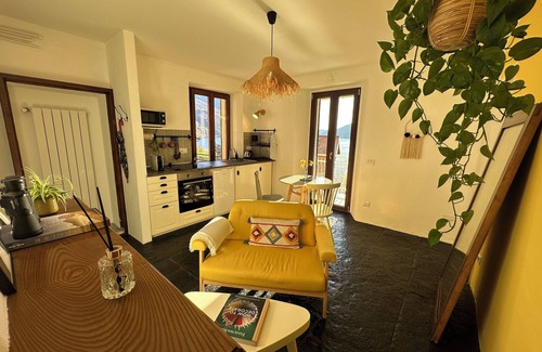 Pognana Lario Apartment | Light and spacious apartment with full lake view, private terrace and large garden access.