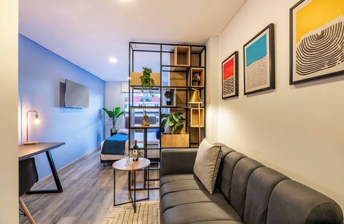 Zona Rosa Apartment | Loft in 85 st w/Fast Wi-fi, Great Location & View