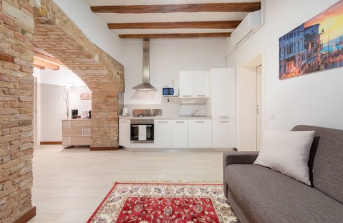 Cannaregio Apartment | Loft on two levels exposed beam