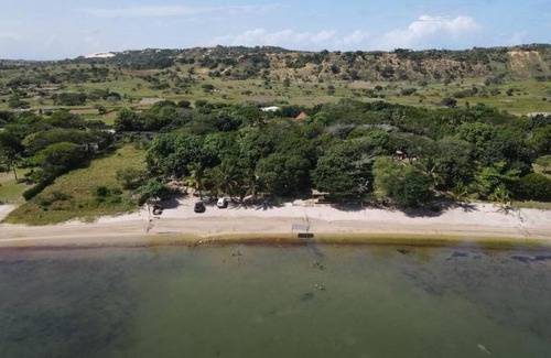 Praia do Bilene House | Log Cabin On And Overlooking a 9km Lagoon