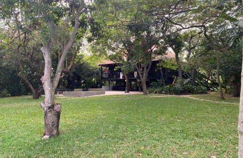 Praia do Bilene House | Log Cabin On And Overlooking a 9km Lagoon