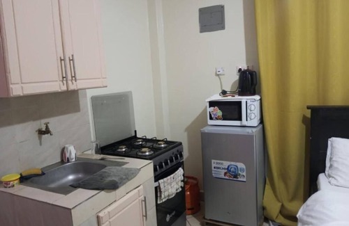 Mbotela Apartment | Lux Suites Attic Place Studio Apartemnts