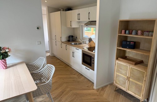 Sevenum House | Luxe chalet op 5-sterren camping met ruime veranda