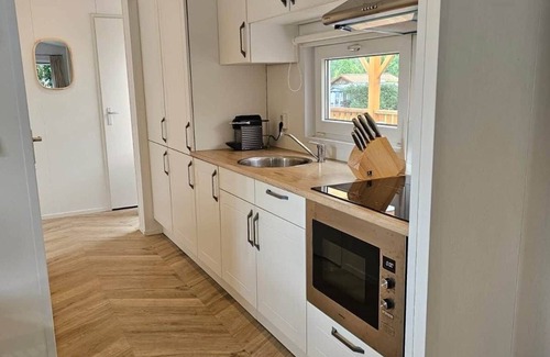 Sevenum House | Luxe chalet op 5-sterren camping met ruime veranda