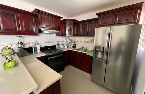 Gregorio Luperon Apartment | Luxury condo with pool gym parking wifi and more