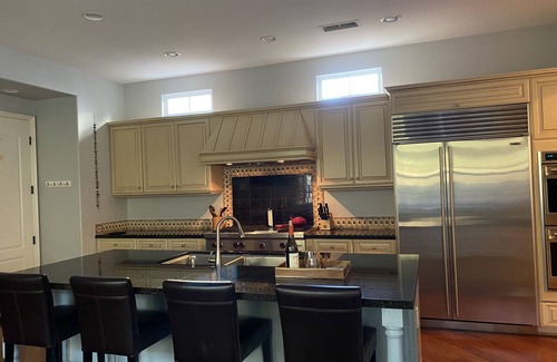 Beach Barber Tract House | Luxurious 4BR Home just steps from Beach-Big Hot Tub,Fire Pit,AC,Bikes,2 K Beds