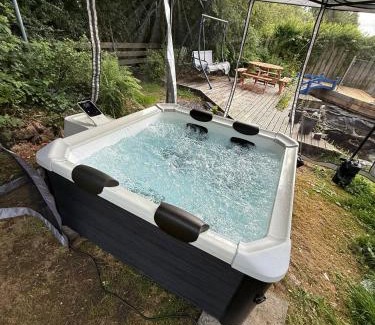 Achachork House | Luxurious Cottage on the River of Portree with Hot Tub!