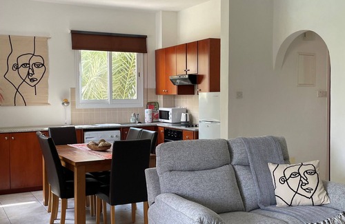 Paphos Apartment | Luxury apartment, UK TV and free WIFI. Near beach and restaurants, pool view