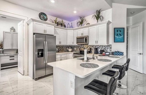 Mariner House | Luxury Canal-Front Retreat with Heated Saltwater Pool - Sleeps 8!