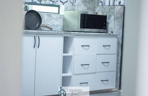 Kitengela Villa | Luxury Home with enough room for family. Rooftop dining with views.