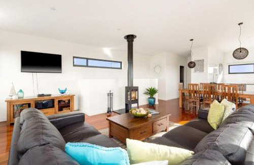 Surf Beach House | Luxury Retreat at Pristine Surf Beach with wood fireplace