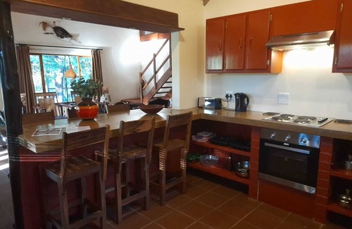 Phalaborwa Villa | Luxury Villa 1 km from Kruger Park veranda overlooking the garden and ponds