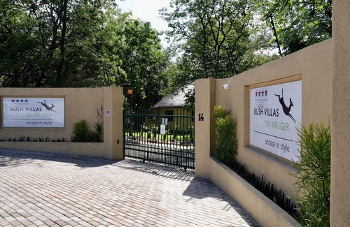 Phalaborwa Villa | Luxury Villa 1 km from Kruger Park veranda overlooking the garden and ponds