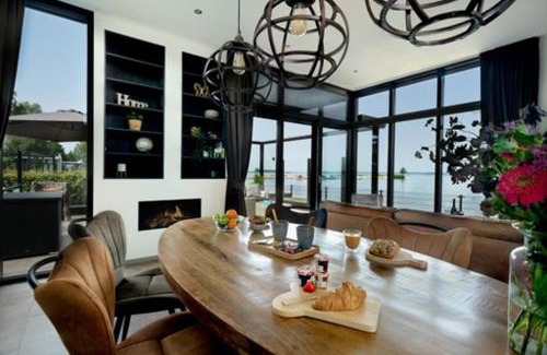 Hulshorst House | Luxus Cube Meerblick Veluwemeer am Strand in erster Reihe