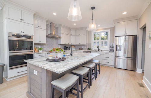 Macon House | Main Lake, luxury tritoon boat, spa, fire pit, water toys and more more more!