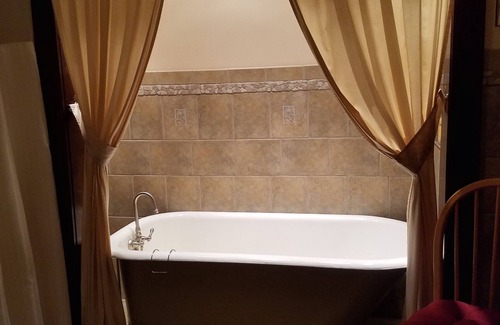 Manistee House | Make Memories this summer, suite, firepit, deck on Lake Michigan