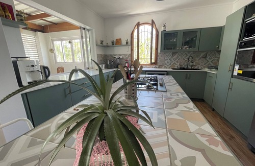 Blue Bay Apartment | Malcolm, 4 bedroom apartment within walking distance of Blue Bay lagoon!