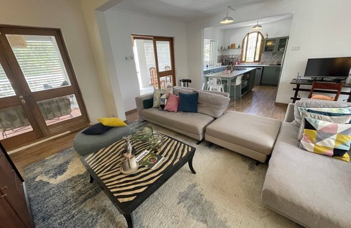 Blue Bay Apartment | Malcolm, 4 bedroom apartment within walking distance of Blue Bay lagoon!