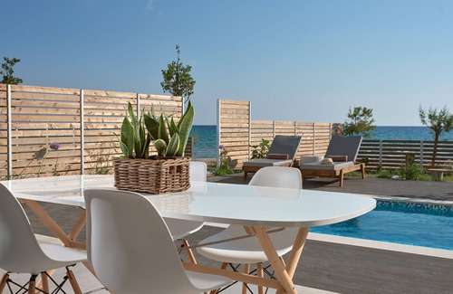 Alykes Apartment | Maritimus Excelsior suites 1 right onto sandy Alykes Beach