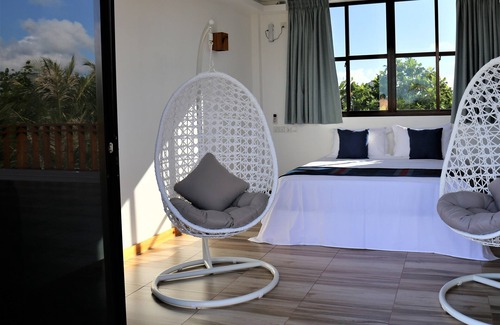 Thulusdhoo Island Bed & Breakfast | Master Suite Family Room with views of the Ocean