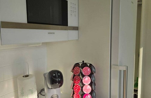 Espoo Apartment | Metsämansikan helmi