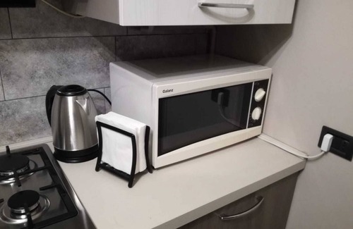 Rho House | Mezzanine studio with independent entrance inside a courtyard