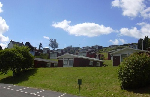 Llanybri Ski Chalet | Milkwood, A lovely Three-bedroomed chalet, sleeps five