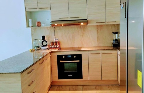 Conocoto Apartment | Minimalist suite with volcano view