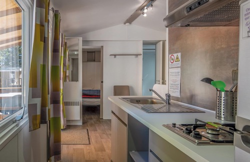 Lavilledieu RV Rental | Mobile Home 'Confort B - 1-5 Persons' with Shared Pool, Private Terrace and Communal Garden