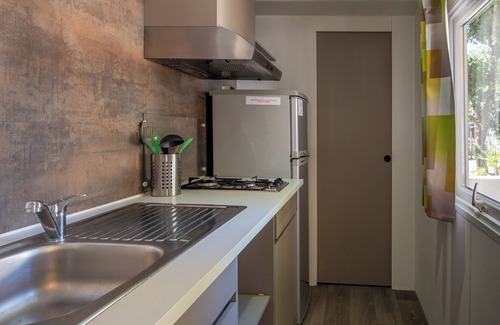 Lavilledieu RV Rental | Mobile Home 'Confort B - 1-5 Persons' with Shared Pool, Private Terrace and Communal Garden