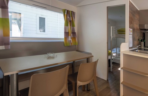 Lavilledieu RV Rental | Mobile Home 'Confort B - 1-5 Persons' with Shared Pool, Private Terrace and Communal Garden