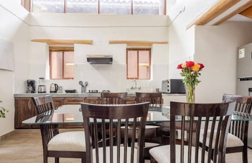 Huaran House | Modern and comfortable house with stunning views of the mountains and waterfall.