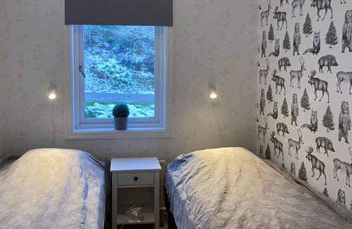 Kinda Municipality House | Modern and cozy cottage overlooking lake Åsunden.